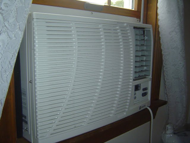 LG WINDOW AIR CONDITIONER - HOME APPLIANCES