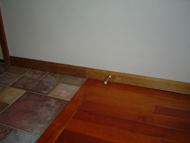 Transitioning baseboard trim from one room to another.