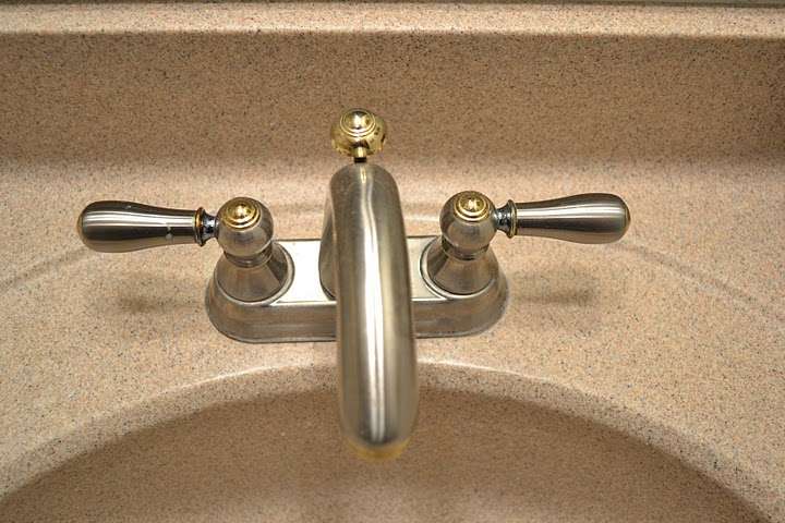 Dual handle centerset bathroom faucet