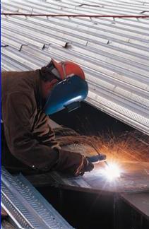 Corrugated roofing materials have made great strides in the past decade in terms of the aesthetics and durability.