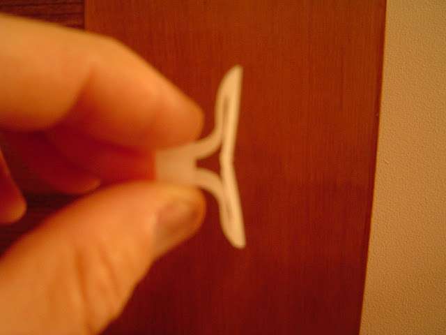 Folded wall anchor for installing towel bar.
