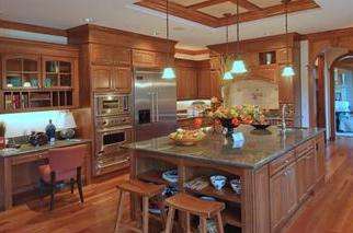 Solid hardwood kitchen cabinets make this kitchen look absolutely stunning.