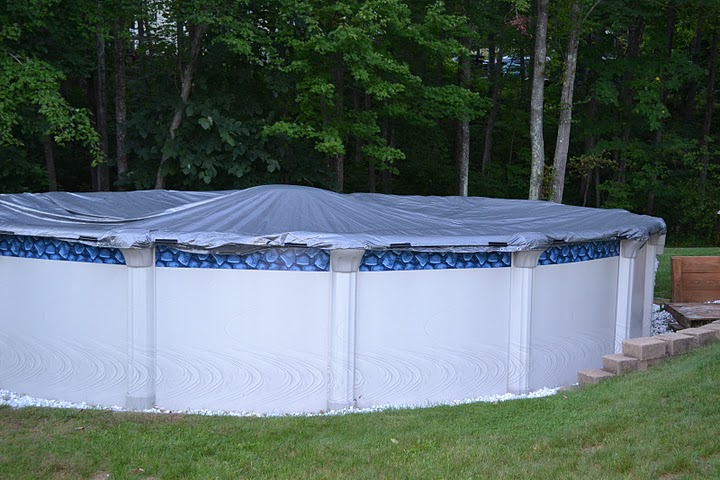 Pool cover clips work better than insulated wire cable for holding down the pool cover.