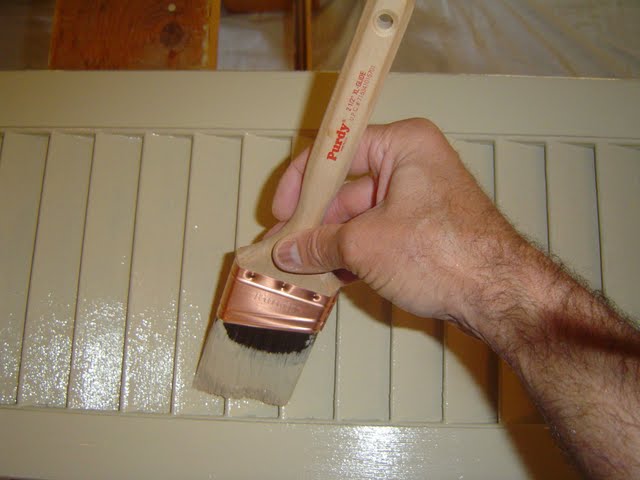 Painting shutter louvers with Purdy paint brush