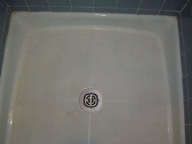 Custom corner shower with fiberglass shower pan
