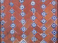 Painting tile is an inexpensive alternative to replacing it.