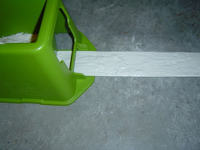 The TapeBuddy applies an even and consistent amount of joint compound to the drywall tape.