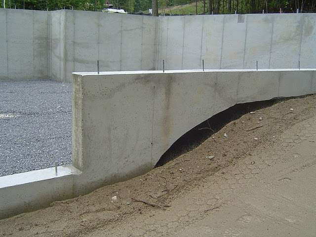 When backfilling foundation walls coarse grain soil should be pushed, rather than dropped, into place.